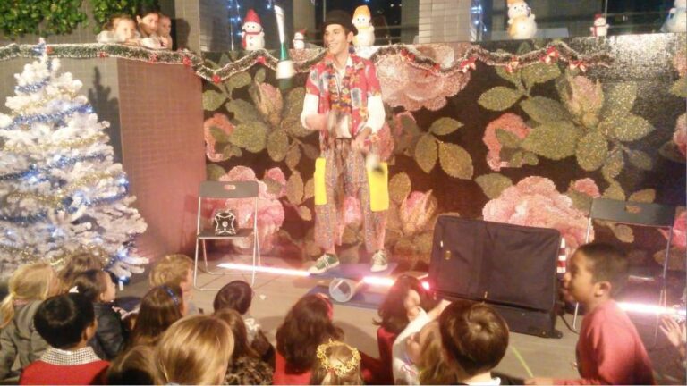 A Kong Kong Professional entertainer performing at Queens Garden Xmas party.