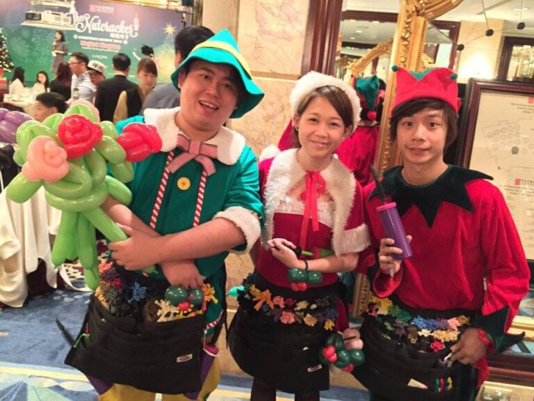 Elf , Santas Helper and another elf performing in shop in Hong Kong