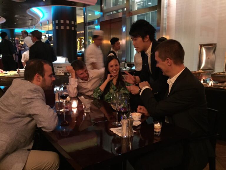 Hong Kong magician performing table magic at CFA Corporate event at peak