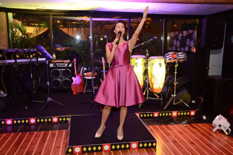 Yamilete in pink dress on stage in Hong Kong