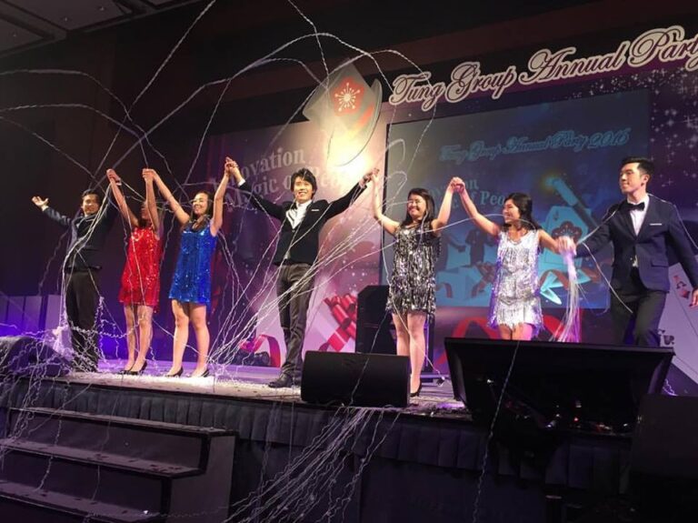 Magician perform magic with Hong Kong Student on stage at a corporate annual dinner