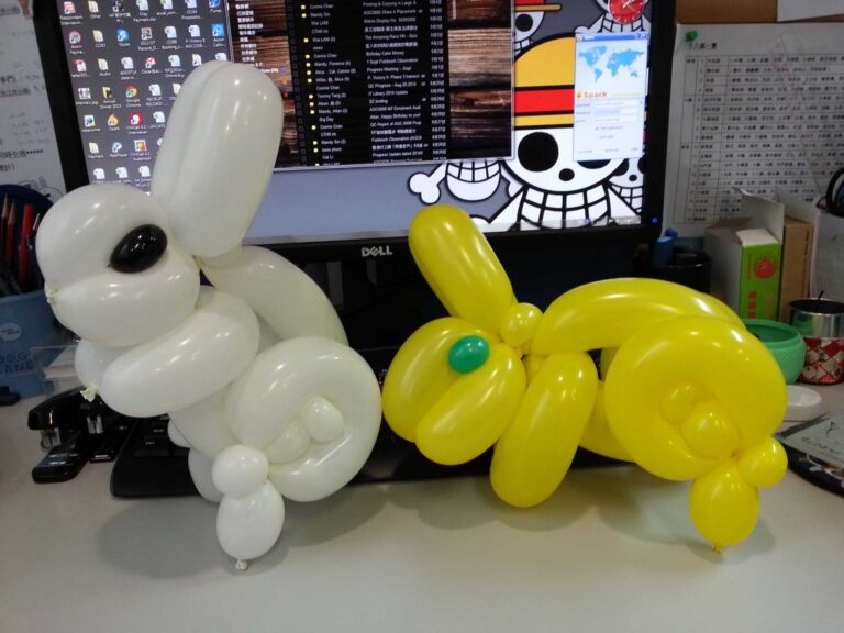 HK Roving balloon artist twisted two rabbit balloons for a Hong Kong mid autumn festival event