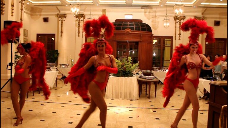 Three Vegas Showgirl dancers in Hong Kong dancing in a corporate annual diner party