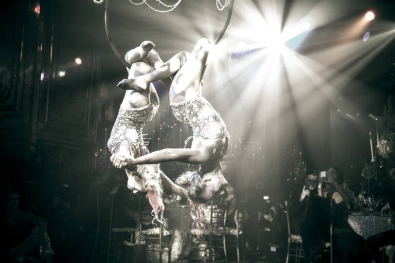 Two HK Aerial Chandelier performer hanged upside down on the grand chandelier pops at a corporate event