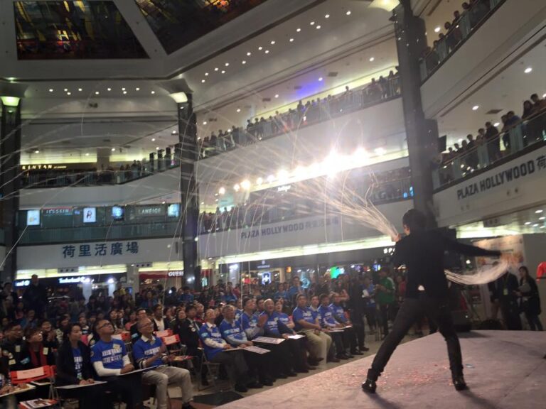 Magician performing stage magic in Hong Kong at a shopping mall corporate event