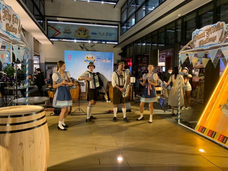 Full costume Oompah band, Hong Kong, with beer girls, Central market Hong Kong, 2023