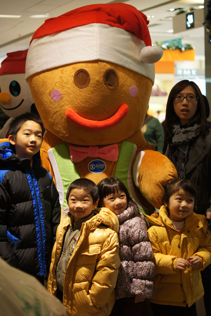 Gingerbread Mascot walking around in shopping center in Hong Kong for shopper