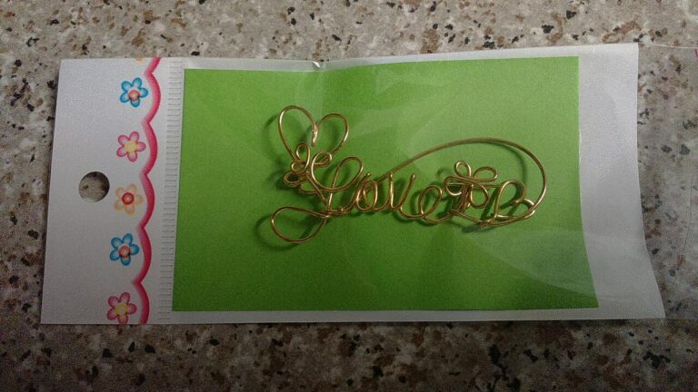 gold color wire names in plastic sleeve for clients
