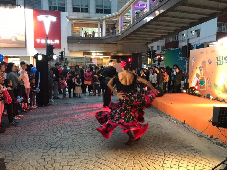 wan chai performance with flamenco dance couple and gathered crowd watching