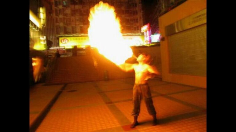 Juggler in HK performing breathing fire act a corporate function.