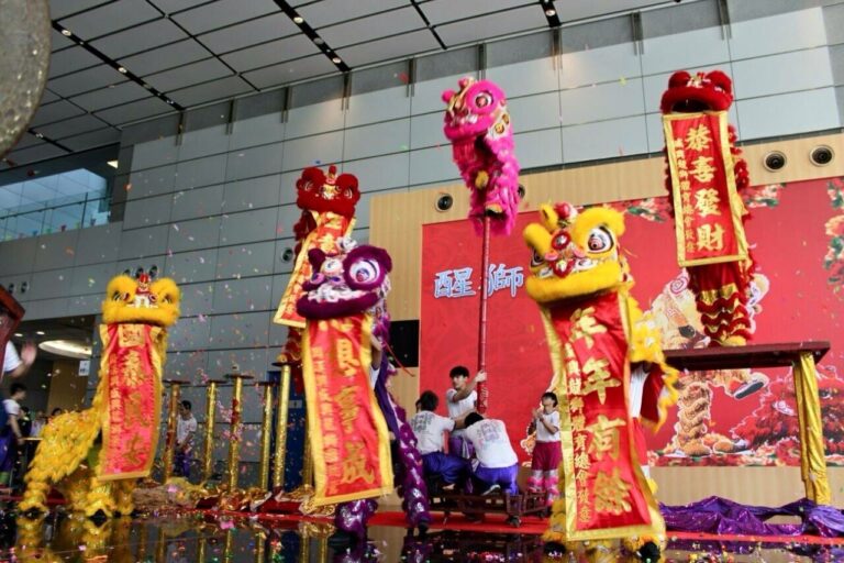 Six team Lion Dance Dancers in Hong Kong performing at a Corporate Chinese New Year function