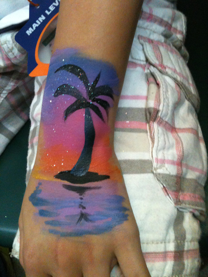 Beautiful Hawaii sunset hand paint from a face paining artist in Hong Kong.