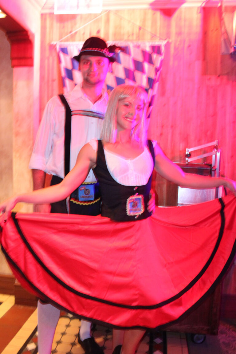 Male and female German dancers at Oktoberfest event at Jockey Club in Hong Kong