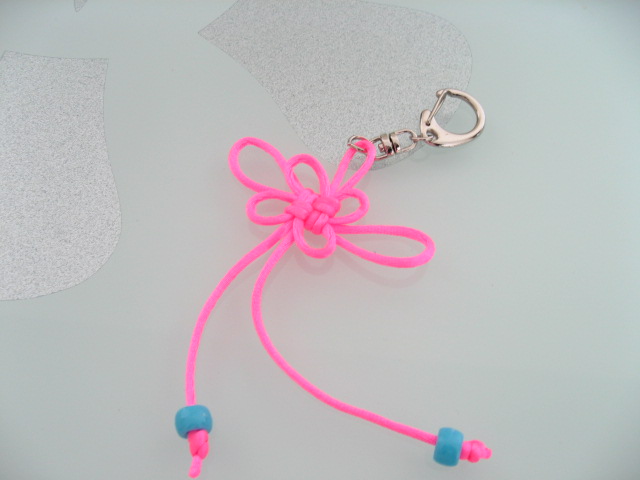 knowtted lucky charm key chain in pink