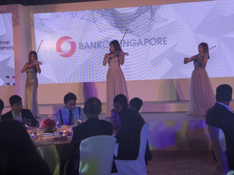 3 girls performing for event bank of singapore