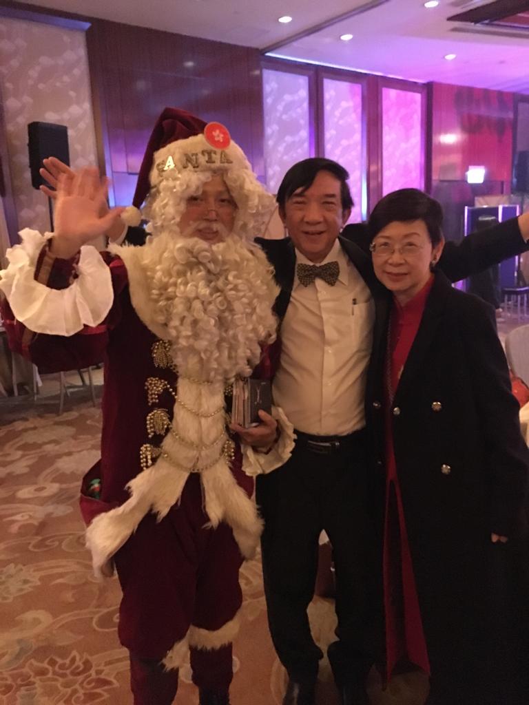 Santa Mario with doctors at an event in Hong kong