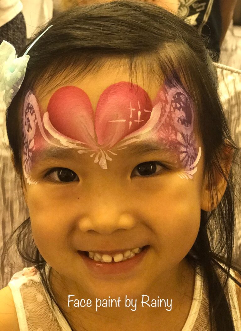 young child with face painting