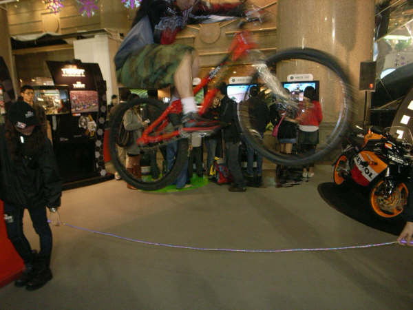 Trail biker Shaun from Hong Kong performs for sporting event