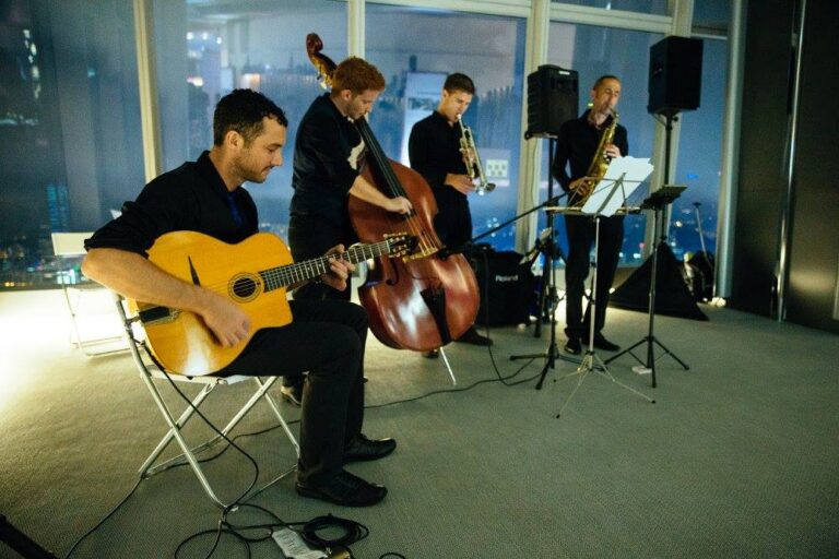 Western music band performs in Hong Kong featuring sax, guitar and cello