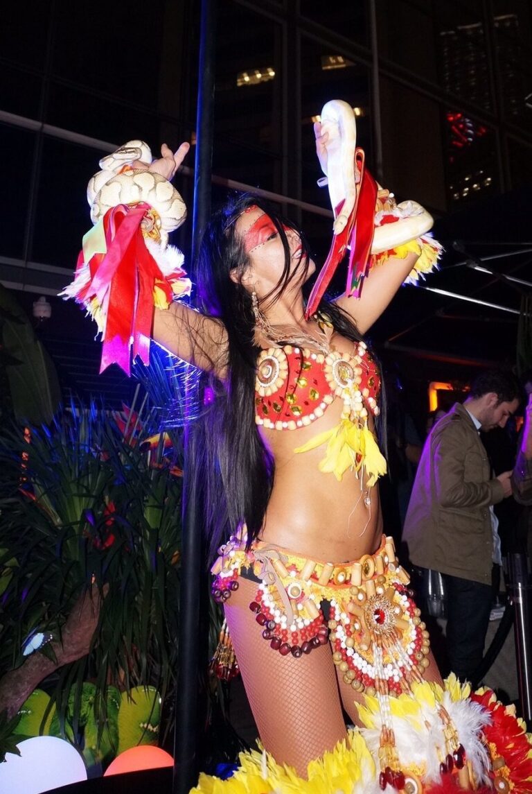 Female dancer performs with snakes