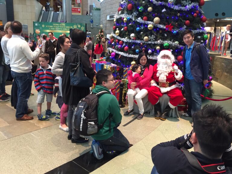 Santa taking pics with family