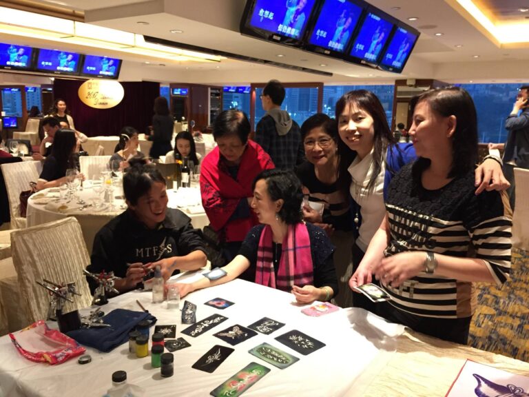 Guests at happy valley racecourse getting their tattoo done