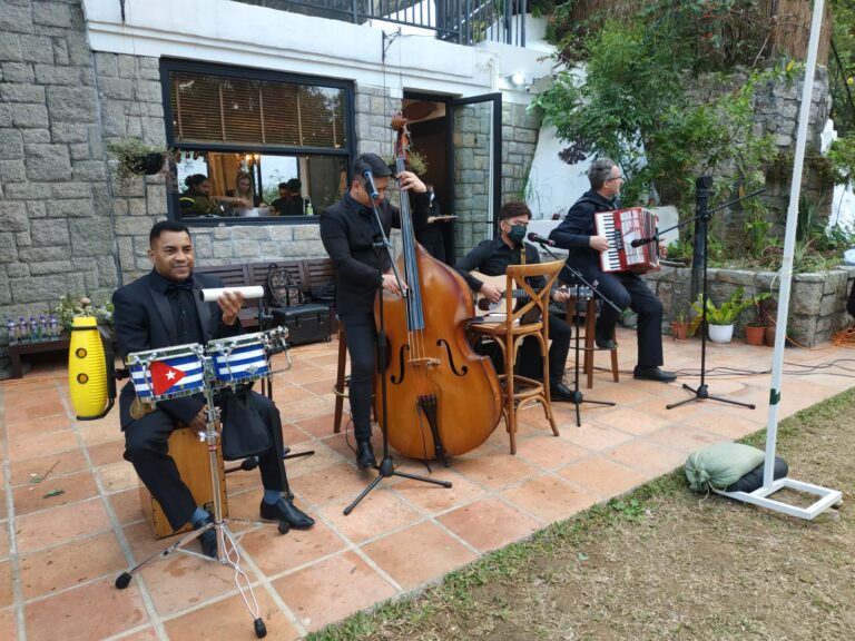 4 musicians in repluse bay Hong Kong, double bass, percussion, accordion, guitar combo