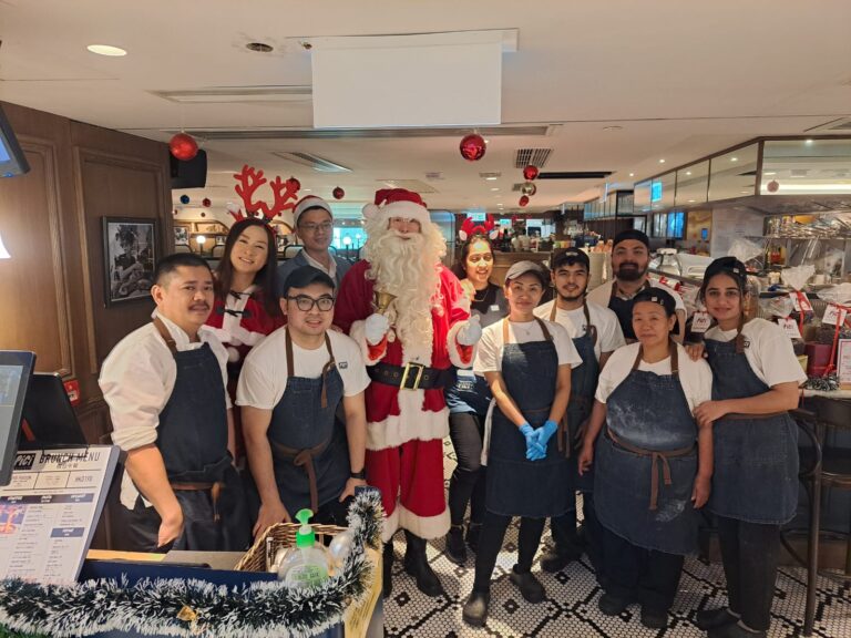 Santa and Santa girl in HK with restuarant group Pirata, Sheung Wan HK, Dec 2023, Hong Kong Christmas, Santa