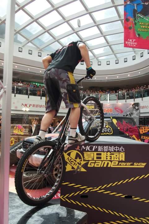 Hong Kong trial bike professional performer performing at a shopping mall summer function