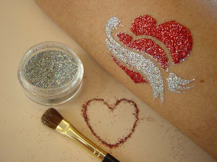 A double heart glittering tattoo by a Hong Kong tattoo artist at a HK school fair.