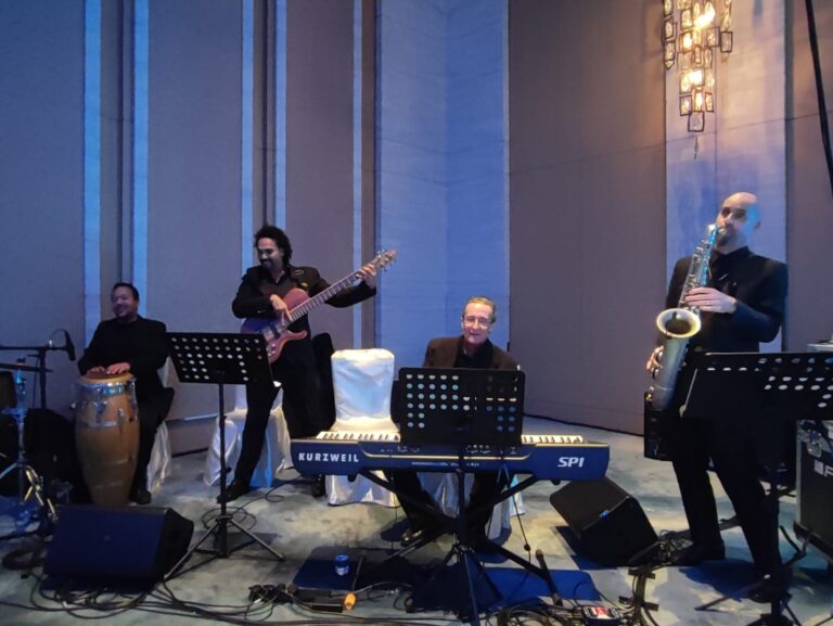 jazz quartet with conga in hong kong, musicians in black out fit ready to perform