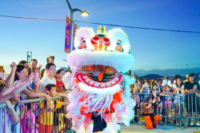 white color lion roving around venue at wan chai harbour chill area in Hong Kong for Hong Kong Tourism board event
