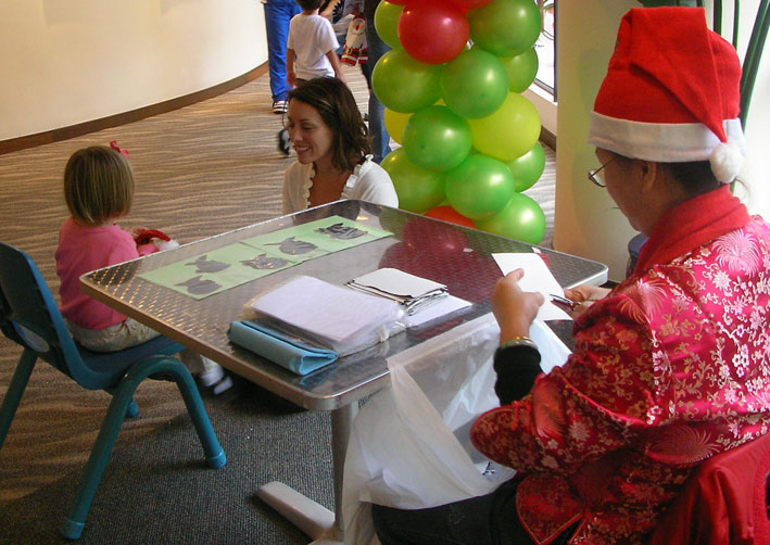 Portrait cutout artist wearing Xmas attire