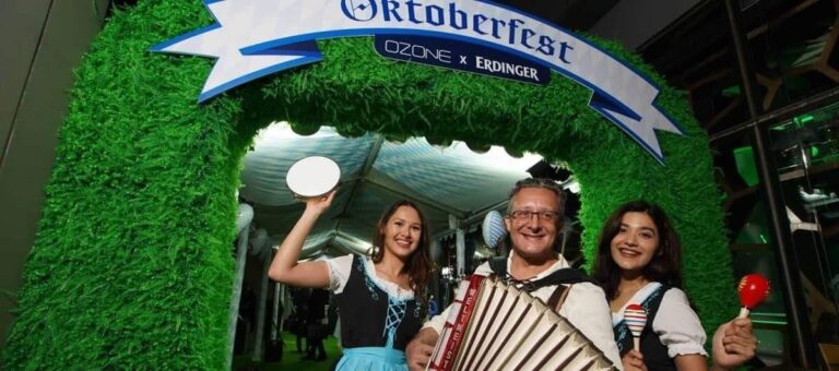 Solo accordion player with beer girl at event for Ritz Carlton hotel