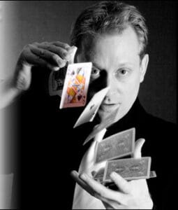 Magician ruffling cards