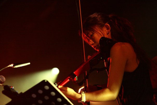 Hong Kong musician during her violin performance