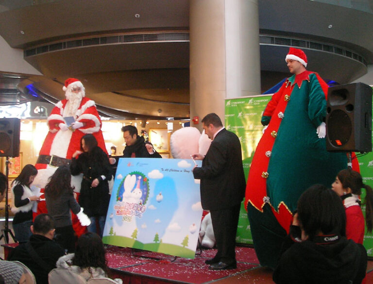two giant stilt walker at cyberport christmas event