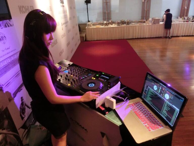Z wing using serato system to dj at Kholer event