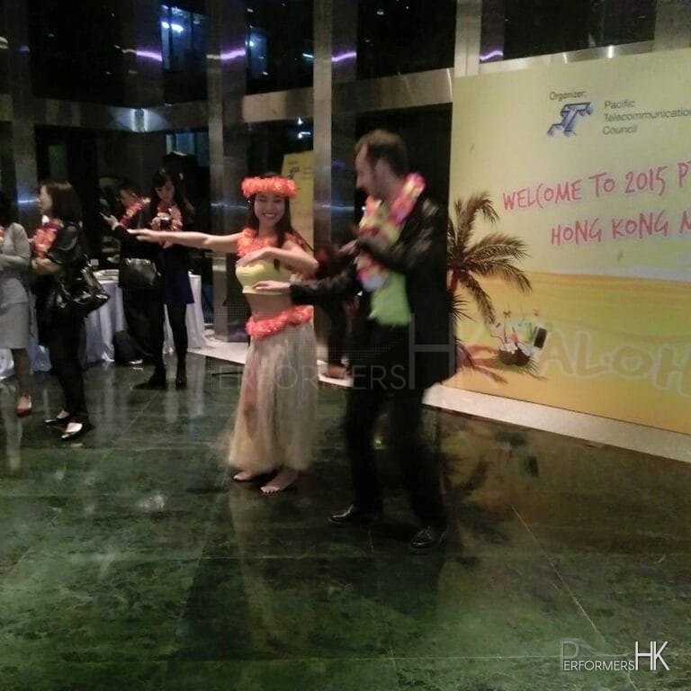 Dancer and male guest interact and dancing on stage