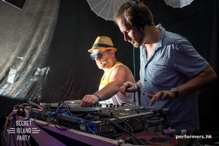 Djing with his partner in Hong Kong to make music