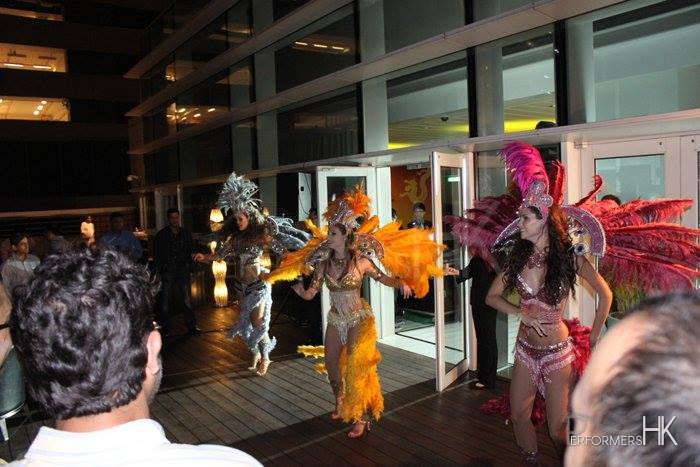 Three Hong Kong Brazilian dancers perform samba at a Hotel