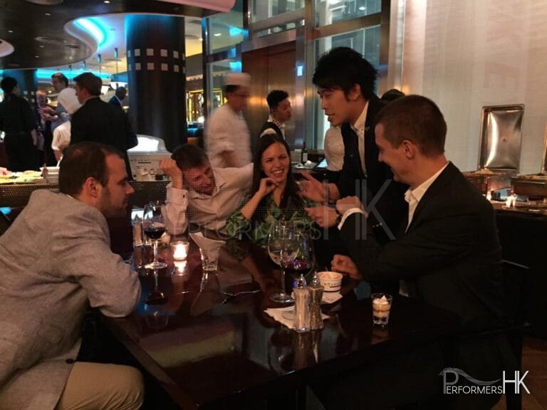 Hong Kong magician performing table magic at CFA Corporate event at peak