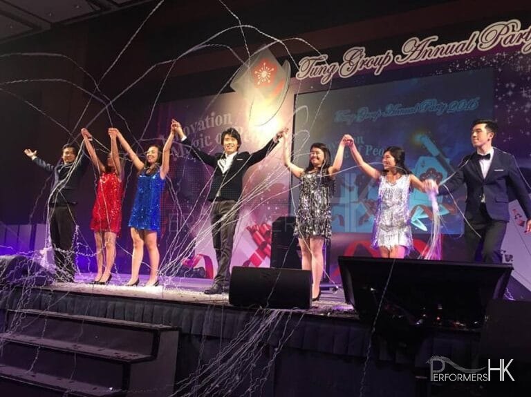 Magician perform magic with Hong Kong Student on stage at a corporate annual dinner