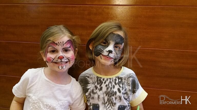 Two girls in easter bunny face paint