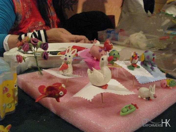 Hong Kong Flour doll artist made flour doll giveaway at corporate event in West Kowloon Bamboo Theatre