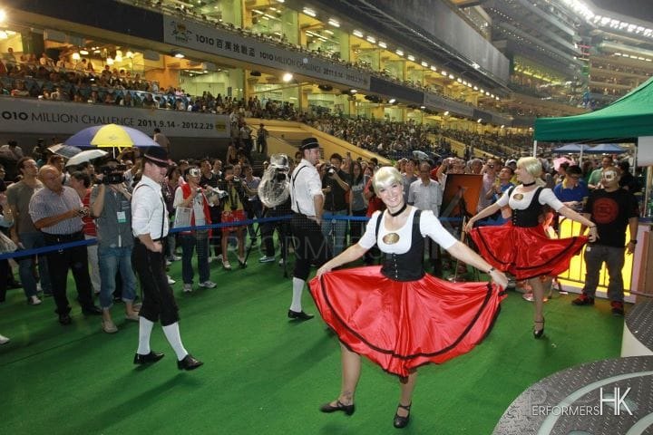 Four German dance dancers and a big crowd of audience at Hong Kong Jockey Club Happy Valley