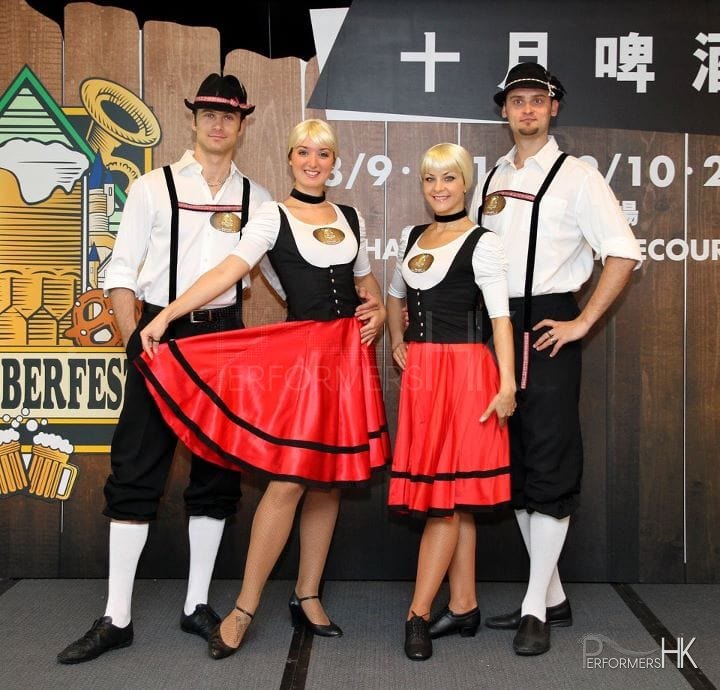 Four German dancers posing for the Hong Kong Jockey Club Oktoberfest press confession event