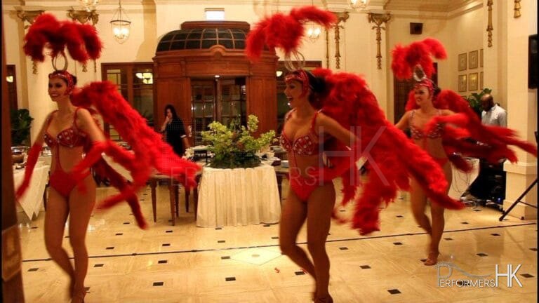 3 dancers performing in vegas show girl costume