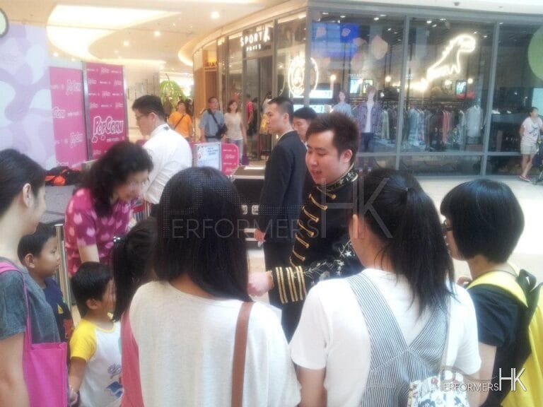 Magic doing tricks in shopping mall in Hong Kong