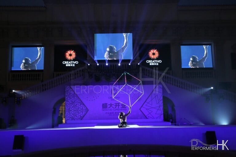 Blue stage with acrobatic performance of LED cube